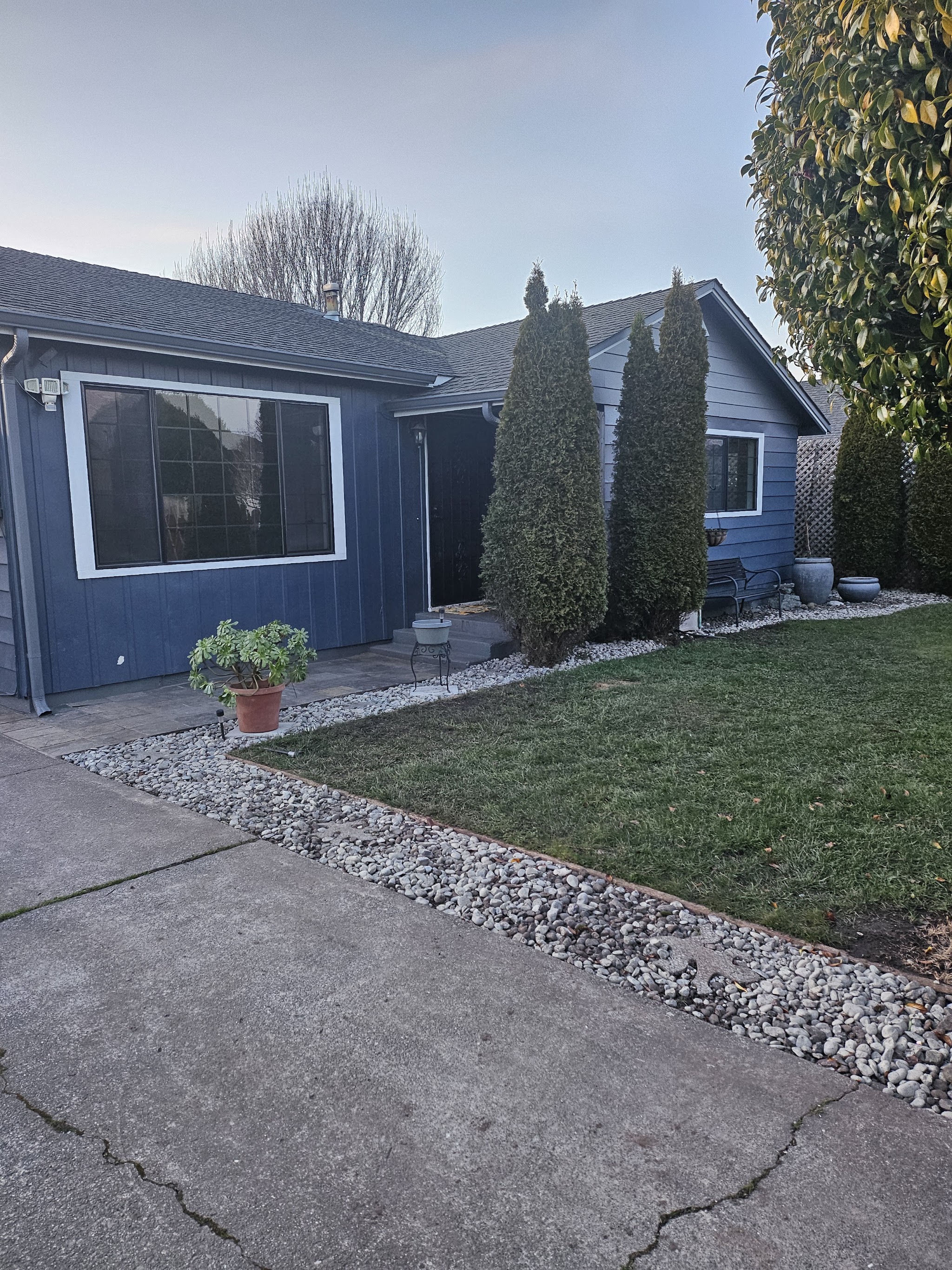 Finished blue residential exterior repaint by Excell Painting